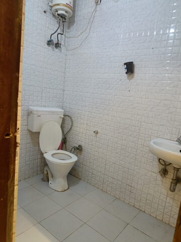 Bathroom in 1 BHK Builder Floor at Ansal Sushant Lok I, Sector 43 – for Rent
