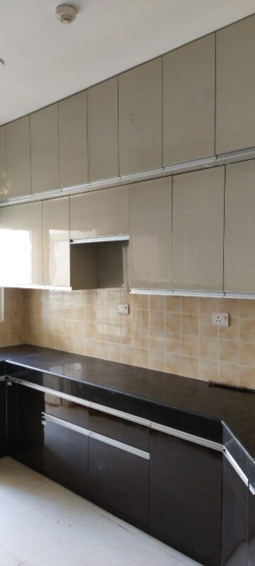 Kitchen in 4 BHK Apartment at Ramprastha Awho, Sector 95 – for Sale