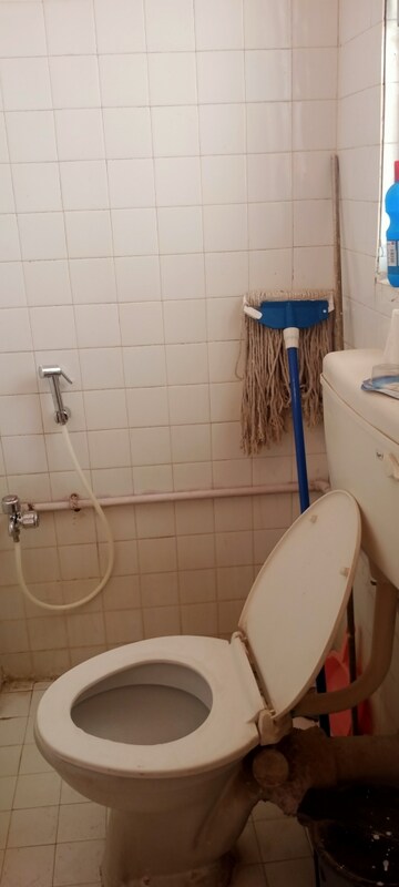 Bathroom in 2 BHK Apartment at Takshila CHS, Andheri East – for Rent