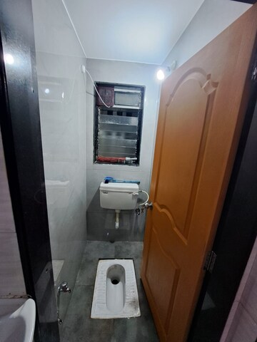 Bathroom in 1 BHK Apartment at Tilak Nagar Building, Tilak Nagar – for Rent