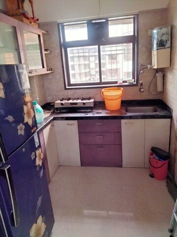Kitchen in 2 BHK Apartment at PSN Yashwant Star, Virar West – for Sale