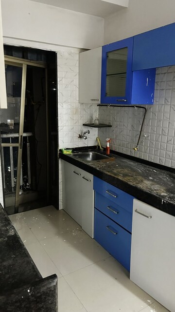 Kitchen in 1 BHK Apartment at Heena Presidency, Mira Road – for Sale