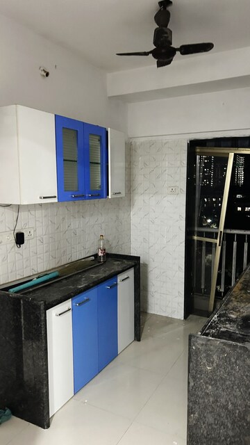 Kitchen in 1 BHK Apartment at Heena Presidency, Mira Road – for Sale
