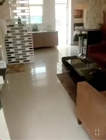 Living Room in 1.5 BHK Apartment at Terra Lavinium, Sector 75 – for Rent