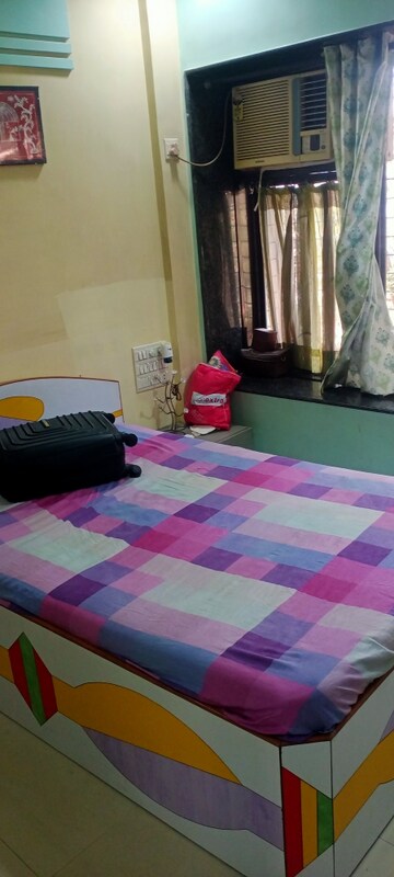 Bedroom in 2 BHK Apartment at Takshila CHS, Andheri East – for Rent