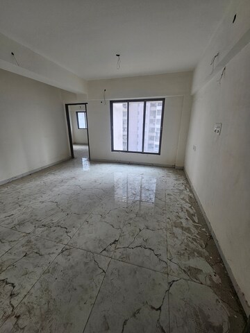 Living Room in 2 BHK Apartment at Elite The New Green Chambers CHS, Byculla – for Sale