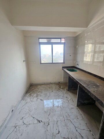 Kitchen in 2 BHK Apartment at Elite The New Green Chambers CHS, Byculla – for Sale