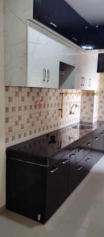 Kitchen in 2 BHK Apartment at Wave Dream Homes, Wave City – for Rent