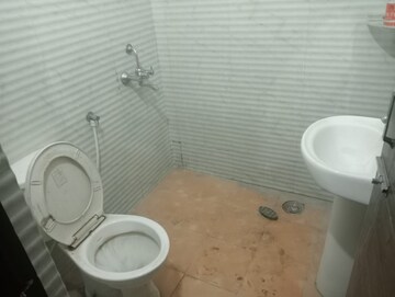 Bathroom in 3 BHK Builder Floor at Guru Nanak Enclave, Dhakoli Village – for Rent