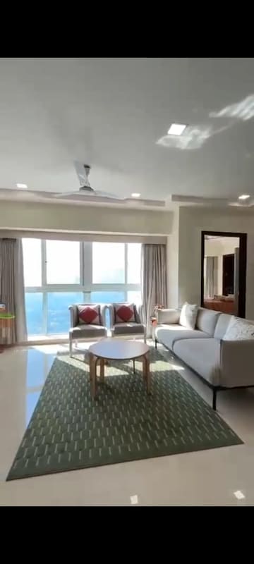 Living Room in 2 BHK Apartment at Ruparel Ariana, Parel – for Rent