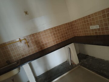 Kitchen in 2 BHK Apartment at Mahagun Mywoods, Sector 16c Greater Noida – for Sale