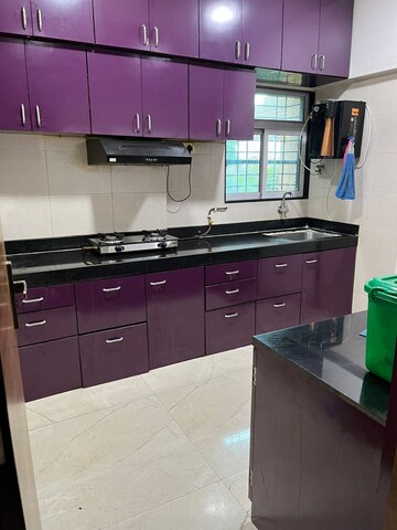 Kitchen in 2 BHK Apartment at Cosmos Habitat, Majiwada – for Rent