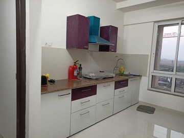 Kitchen in 1 BHK Apartment at Puranik Rumah Bali, Ghodbunder Road – for Rent