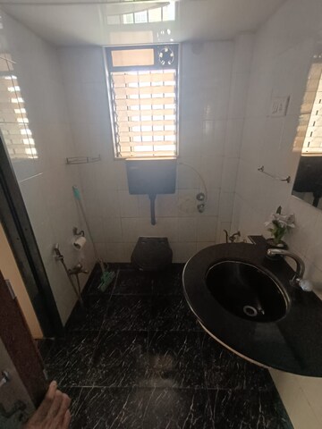 Bathroom in 2 BHK Apartment at Kalpataru Radiance, Goregaon West – for Rent