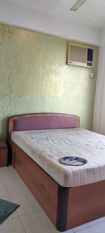 Bedroom in 2 BHK Apartment at Evershine Moon CHS, Kandivali East – for Rent