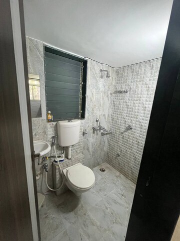 Bathroom in 2 BHK Apartment at Mohan Willows, Badlapur East – for Rent