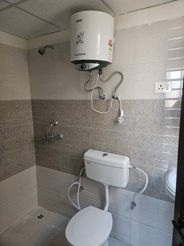 Bathroom in 2 BHK Apartment at Signature Global Orchard Avenue, Sector 93 – for Rent