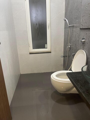 Bathroom in 3 BHK Apartment at Omkar Alta Monte, Malad East – for Rent