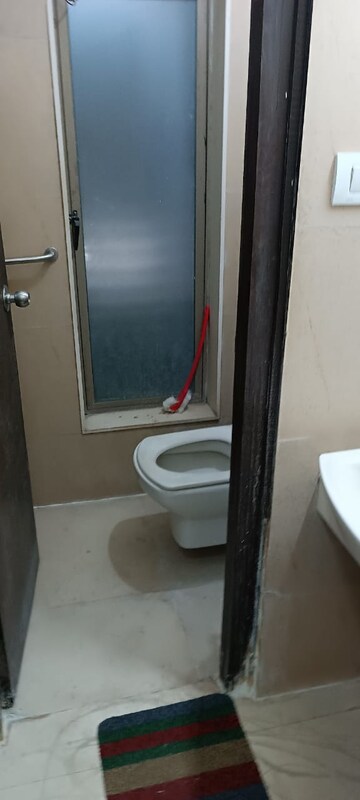 Bathroom in 1 BHK Apartment at RDC Woods Teakwoods, Ghodbunder Road – for Rent