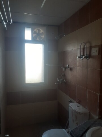 Bathroom in 2 BHK Apartment at Mahagun Mywoods, Sector 16c Greater Noida – for Sale
