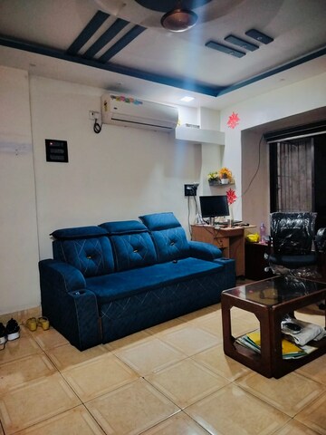 Living Room in 1 BHK Apartment at Om Omkar CHS, Kalwa – for Rent