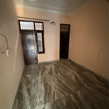 Bedroom in 2 BHK Builder Floor at Dhakoli Village – for Rent