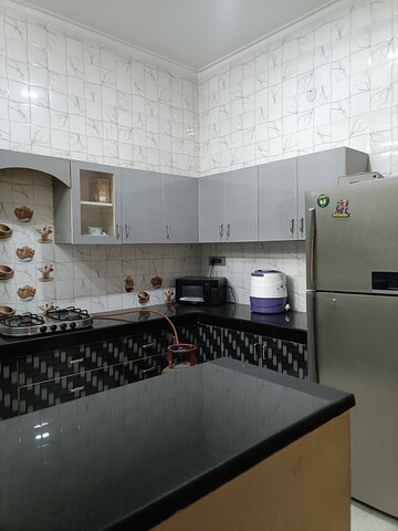 Kitchen in 3 BHK Builder Floor at Ansal Plaza Sector-23, Sector 23 – for Rent