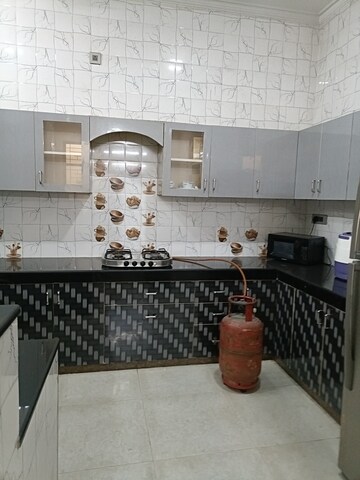 Kitchen in 3 BHK Builder Floor at Ansal Plaza Sector-23, Sector 23 – for Rent