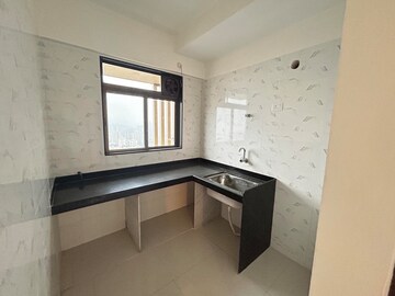 Kitchen in 1 BHK Apartment at Chandak Nishchay Wing B, Borivali East – for Sale