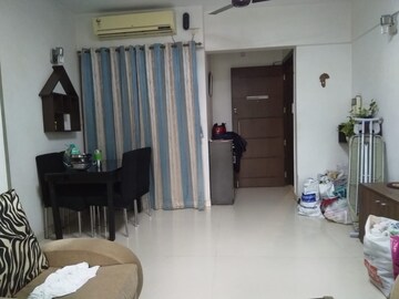 Living Room in 1 BHK Apartment at NG Shelter, Mira Road – for Rent