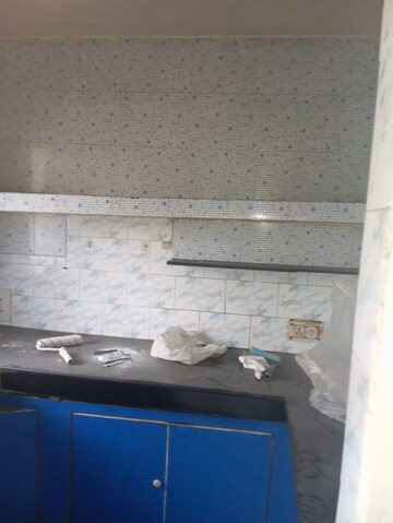 Kitchen in 2.5 BHK Apartment at RWA Jalvayu Vihar, Sector 25 – for Rent