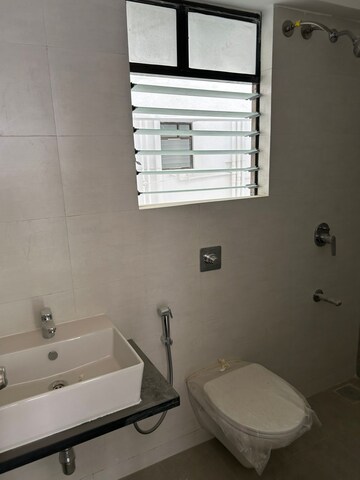 Bathroom in 2 BHK Apartment at Roshan Milestone, Tathawade – for Sale
