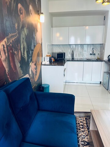 Living Room in 1 BHK Apartment at Sunworld Arista, Sector 168 – for Rent