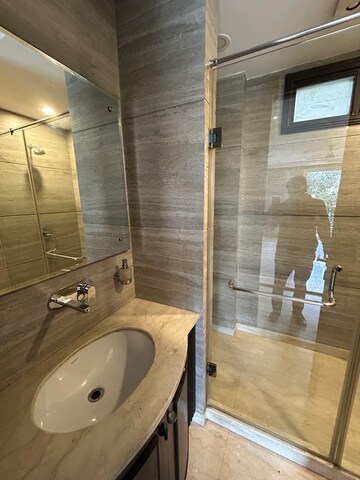 Bathroom in 4 BHK Apartment at Uday Park – for Rent