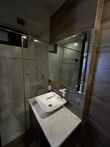 Bathroom in 4 BHK Apartment at Uday Park – for Rent