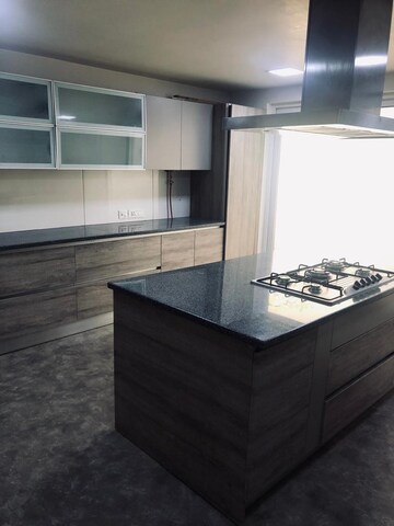 Kitchen in 4 BHK Apartment at Vasant Vihar – for Sale