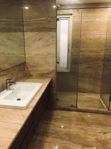 Bathroom in 4 BHK Apartment at Vasant Vihar – for Sale
