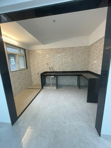 Kitchen in 2 BHK Apartment at Sai Pleasure, Wakad – for Sale