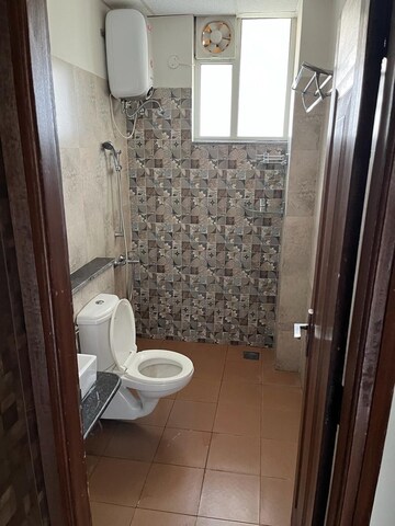 Bathroom in 3 BHK Apartment at Sushma Crescent, Dhakoli Village – for Rent