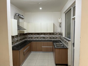 Kitchen in 3 BHK Apartment at Sushma Crescent, Dhakoli Village – for Rent