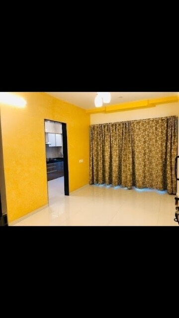 Living Room in 1 BHK Apartment at Agarwal Paramount, Virar West – for Rent