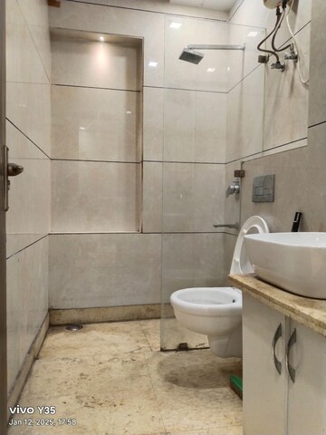 Bathroom in 3 BHK Apartment at Paschim Vihar – for Rent