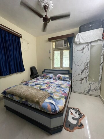 Bedroom in 2 BHK Apartment at Roof Top Chs Ltd, Andheri East – for Rent