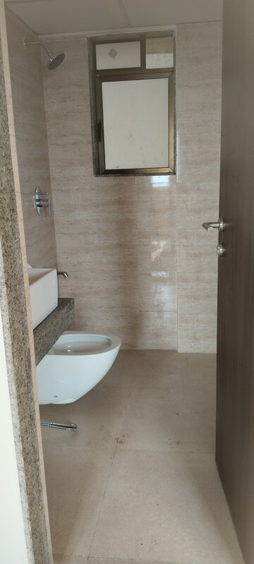 Bathroom in 1 BHK Apartment at Sunteck Maxxworld, Naigaon East – for Rent