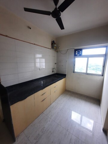 Kitchen in 1 BHK Apartment at Fiama Residency, Ghodbunder Road – for Rent