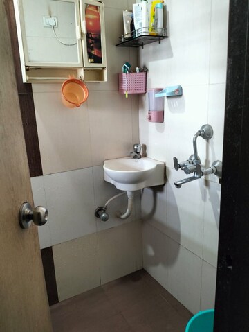 Bathroom in 2 BHK Apartment at Sudarshan Sky Garden, Ghodbunder Road – for Rent