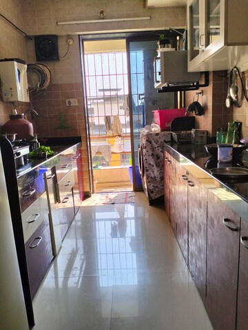 Kitchen in 2 BHK Apartment at Sudarshan Sky Garden, Ghodbunder Road – for Rent