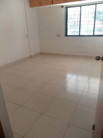 Bedroom in 2 BHK Apartment at Vyas Aasawari CHS, Ideal Colony – for Rent