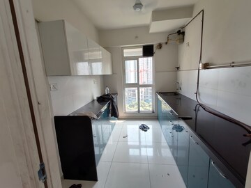 Kitchen in 3 BHK Apartment at Godrej Emerald, Ghodbunder Road – for Sale