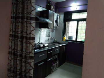 Kitchen in 1 BHK Apartment at Krishna Greenland Park Vastu Federation, Ghodbunder Road – for Rent